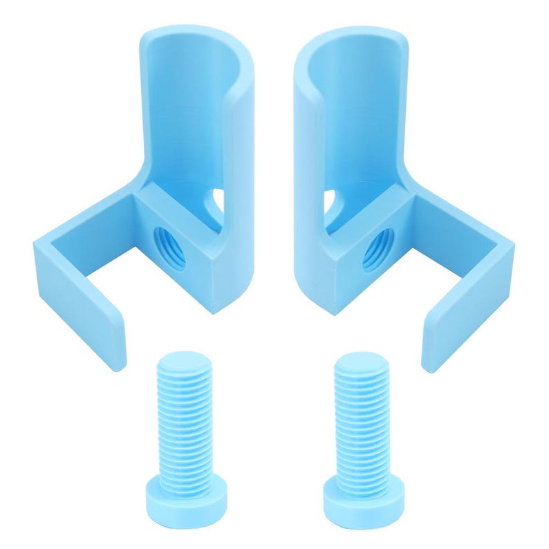 May include: Two light blue L-shaped mounting brackets with a cylindrical top section and a threaded hole on the side, accompanied by two matching light blue threaded bolts. The components are solid in color and feature a smooth, matte finish.