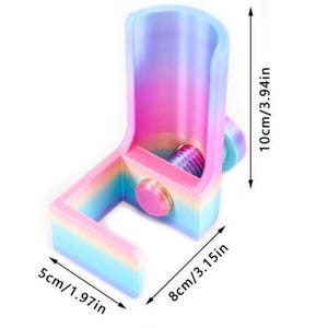 May include: A rainbow-colored gradient plastic holder with a cylindrical top section and a rectangular base. The object features a screw-in knob on the side. Dimensions are clearly marked as 10cm/3.94in in height, 8cm/3.15in in length, and 5cm/1.97in in width.