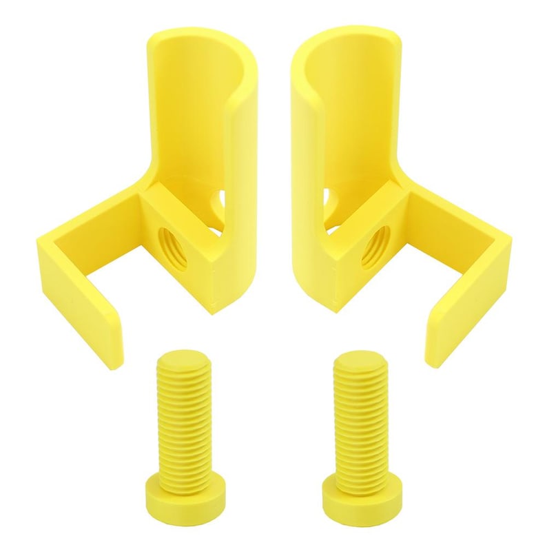 May include: Two bright yellow U-shaped mounting brackets with a threaded hole on the side, accompanied by two matching yellow threaded bolts. These components feature a smooth, matte finish and are designed for secure attachment and alignment.