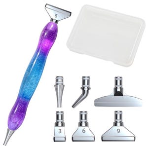 May include: A diamond painting pen with a purple and blue glitter handle, silver tip, and interchangeable heads. Includes a clear plastic storage case and several silver applicator tips with sizes 3, 6, and 9.