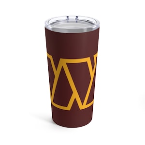 May include: A maroon stainless steel tumbler with a gold geometric design. The tumbler has a lid and is ideal for keeping drinks cold or hot.
