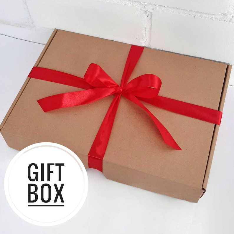 Sensory board is packed in a craft cardboard box, you can also add a festive red bow to make it an ideal gift.