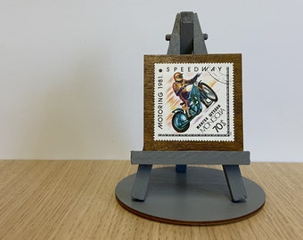 Speedway stamp ornament with easel, base and gift wrap included
