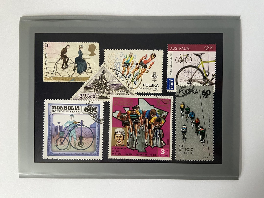 Cycling Postage Stamps Dated From 1972 Onwards on a Large Fridge