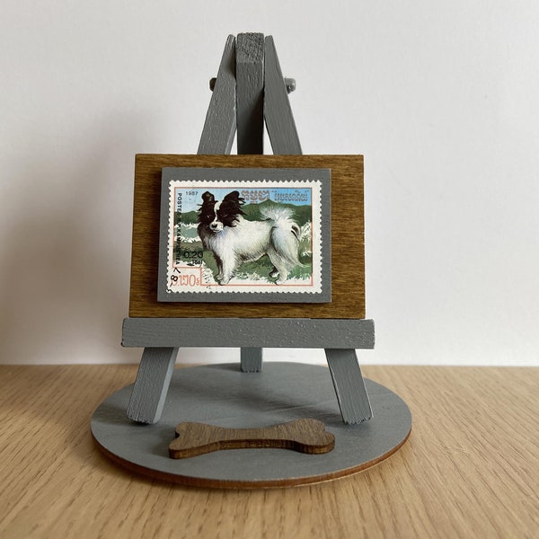 Papillon dog ornament - 1987 postage stamp of a Papillon dog with a wood easel, base & gift wrap included. Int post at cost.  Papillon toy