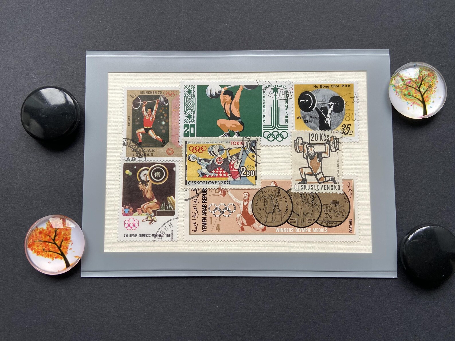 Weight lifting on postage stamps dated from 1972 onwards on a Etsy