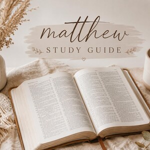 May include: An open book with printed text on white pages, positioned centrally. Above the book, the text reads matthew STUDY GUIDE in a dark brown script and sans-serif font. The scene includes a ceramic vase with dried grass and a ceramic mug.