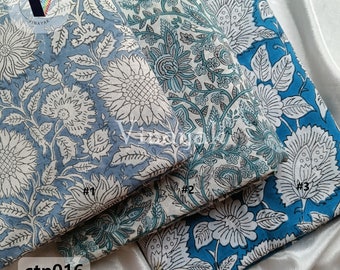 May include: Three pieces of blue and white floral patterned fabric. The fabric is folded and stacked on top of each other. The fabric is labeled #1, #2, and #3. The fabric is labeled ctn016.