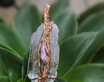 clear quartz with pink and green tourmaline