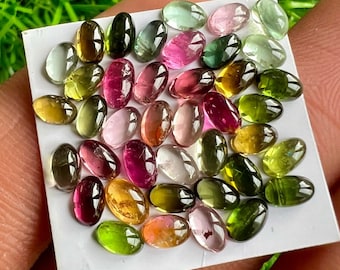Cabochons met meerdere toermalijnen: ovale edelstenen van 3 x 5 mm, lot van 40 stuks
