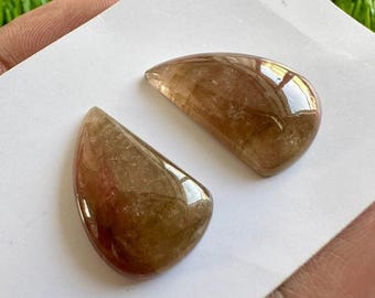 Par de fatias de turmalina bicolor natural: cabochões de pedras preciosas soltas (21,00 cts)