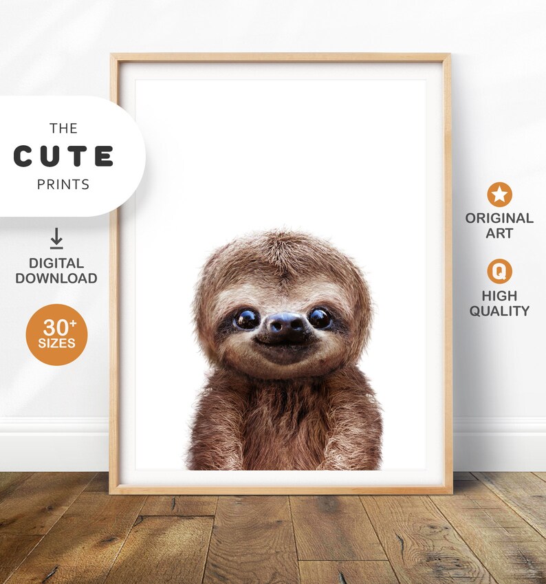 May include: A digital download of a cute sloth illustration. The sloth is brown and has big eyes. The illustration is on a white background. The text "THE CUTE PRINTS" is in the top left corner of the image. The text "ORIGINAL ART" is in the top right corner of the image. The text "HIGH QUALITY" is in the bottom right corner of the image.