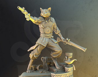May include: A gold-painted figurine of a cat-like creature holding a pistol and standing on a decorative base. The creature is wearing a detailed, ornate costume and has a serious expression.