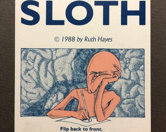 May include: A white card featuring the word "SLOTH" in navy blue. An illustration of a peach-toned figure writing with a pencil is below. The text "© 1988 by Ruth Hayes" and "Flip back to front" are also visible.