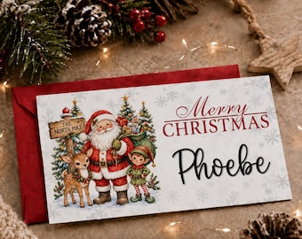 May include: A rectangular Christmas card featuring a festive illustration of Santa Claus, a reindeer, and an elf standing near a North Pole sign. The card displays the text Merry Christmas and the name Phoebe in black script on a snowflake background.