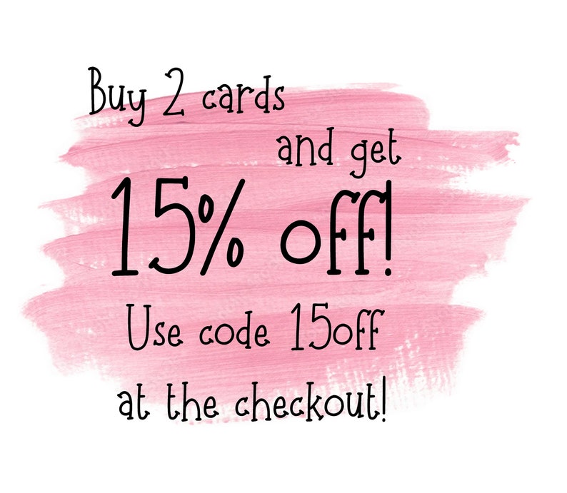 May include: Pink brushstroke background with black text. The text reads "Buy 2 cards and get 15% off! Use code 15off at the checkout!"
