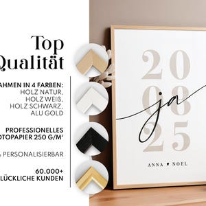 May include: A framed poster featuring the year 2025 in large beige font with the cursive text ja overlaid in black. Below, the names Anna and Noel are printed. Four circular insets display frame options in natural wood, white, black, and gold.