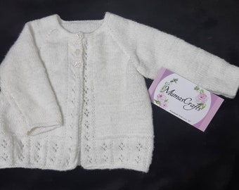 Handmade knitted baby cardigan. Lacy matinee cardigan