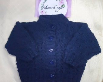 Handmade knitted baby cardigan