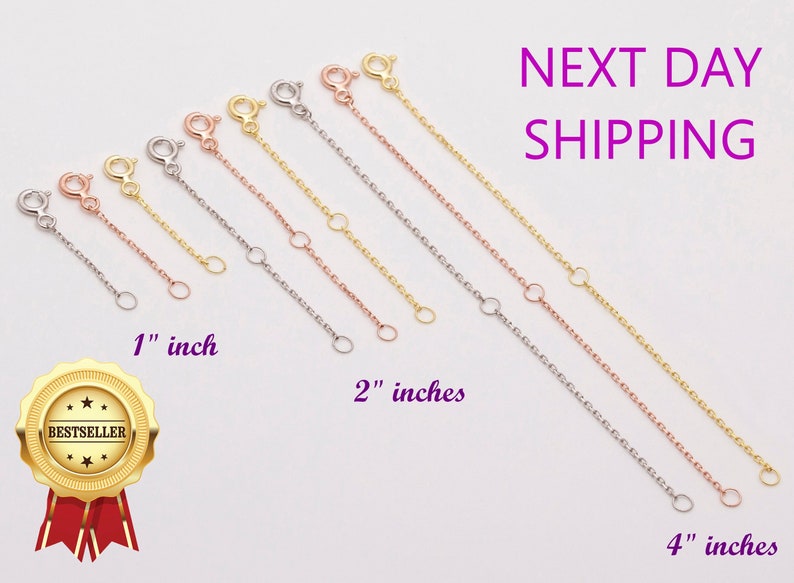 May include: Three gold, silver, and rose gold chain extenders in 1, 2, and 4 inch lengths. The extenders are made of delicate chain links and have a lobster clasp on one end and a jump ring on the other.  The text "NEXT DAY SHIPPING" is in purple text at the top of the image.