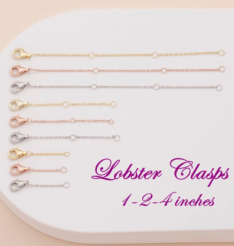 May include: A set of eight gold, rose gold, and silver lobster clasps in various lengths from 1 to 4 inches.