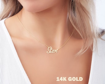 May include: A gold necklace with the name "Steve" in cursive script. The necklace is made of 14k gold.