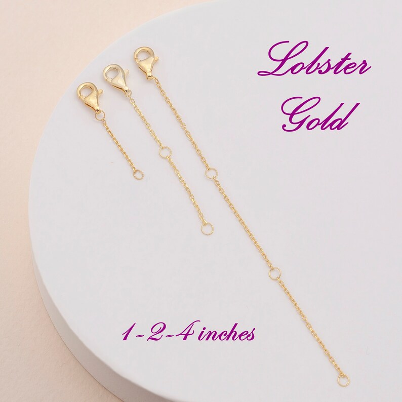May include: Three gold lobster claw clasps with jump rings. The clasps are 1, 2, and 4 inches long.  Lobster Gold 1-2-4 inches.