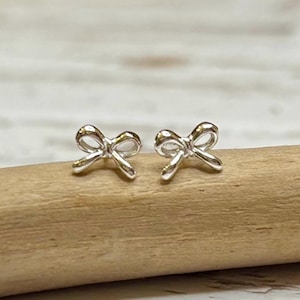 Dainty Sterling silver bow earring studs