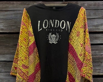 Poncho estilo camiseta reciclado con mariposa de Pink London