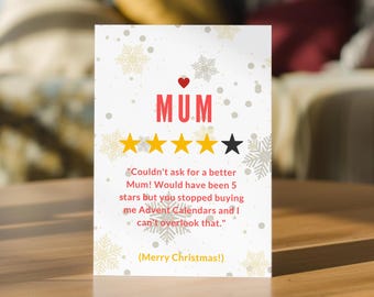 May include: A white greeting card featuring a red heart above the word MUM in red letters. Below are four yellow stars and one black star. The text reads: Couldn't ask for a better Mum! Would have been 5 stars but you stopped buying me Advent Calendars and I can't overlook that. (Merry Christmas!)