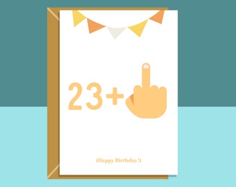 May include: A white card with a brown envelope. The card has a yellow and orange banner with flags at the top. The card says "23+" with a middle finger emoji. The card also says "(Happy Birthday!)"