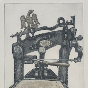 May include: Etching of a vintage printing press, with an eagle emblem. The press is depicted in grey and black tones, showcasing its mechanical parts. The text "Cotterell" is visible on the machine.