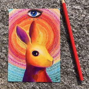 Cartolina Il coniglio e il terzo occhio, stampa di une'illustrazione fatta con pittura acrylique.
