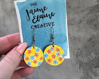 Hand-painted, one of a kind, floral earrings -- yellow with orange and blue, circle shape -- laser cut wood, lightweight dangle earrings
