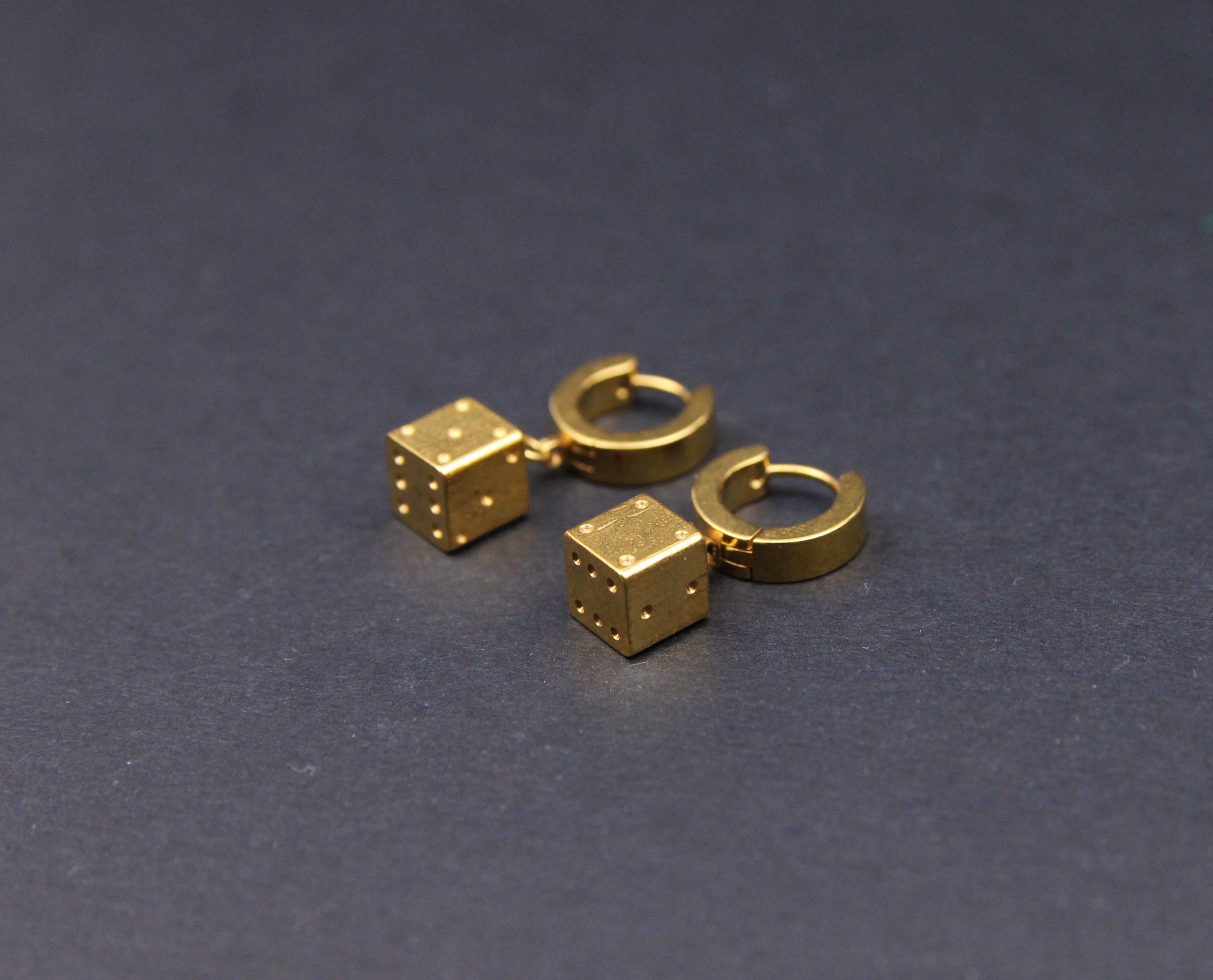 Gold dice best sale earrings