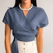 see more listings in the Tops | Blouses section