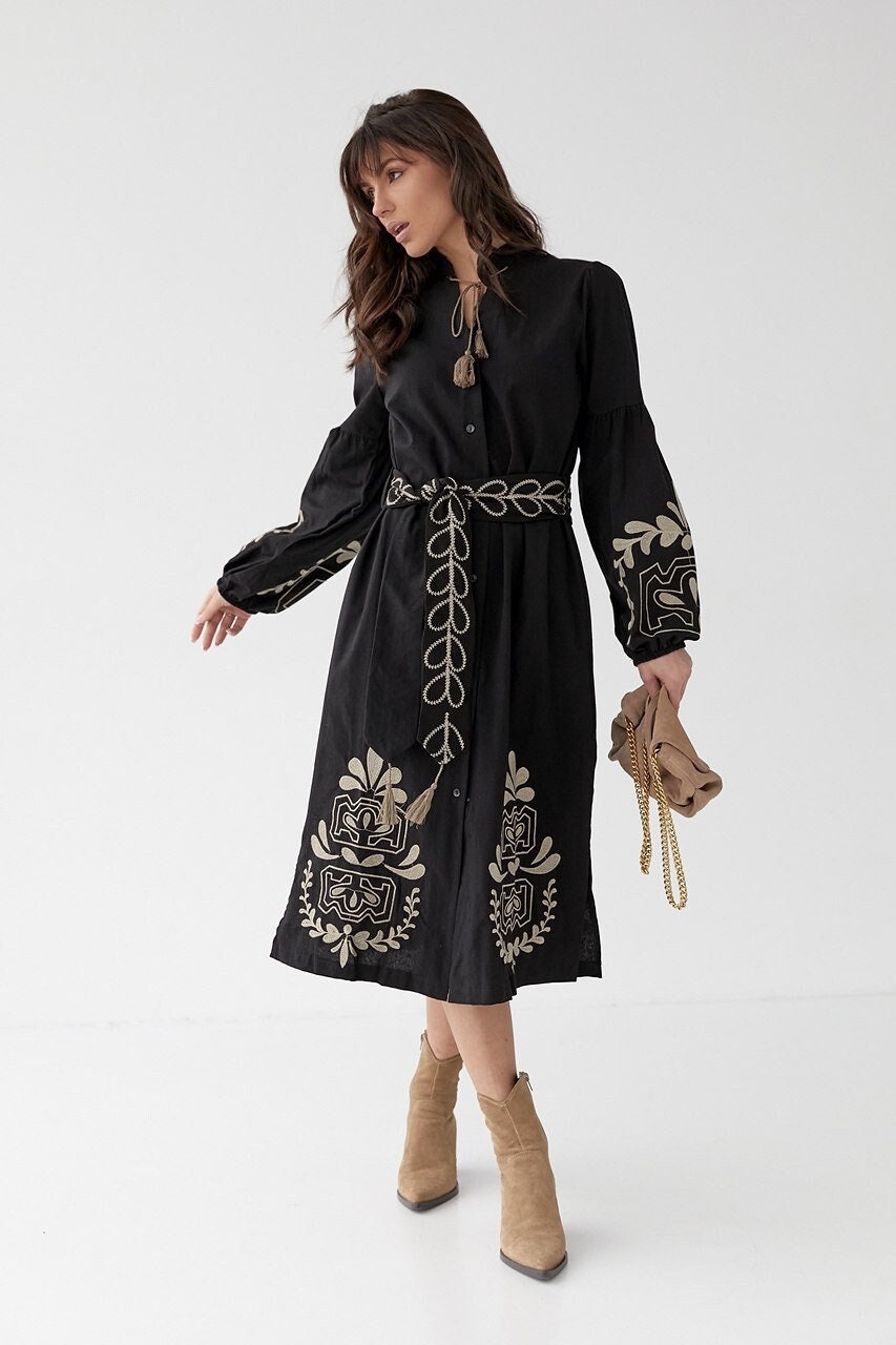 slim fit dress slacks Shop Now: A Striking Black and Gold Dress with Distinctive Embroidery  Accents and a Cape!