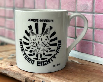 George Orwell's Nineteen Eighty-Paw Bone China Mug for Book and Cat Lovers Literary Gift