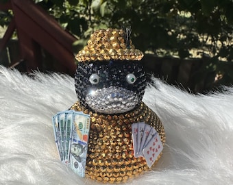 Pato de casino con lentejuelas brillantes