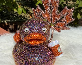 Pato otoñal con lentejuelas brillantes