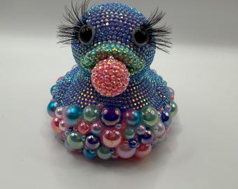 Pato brillante con chicle