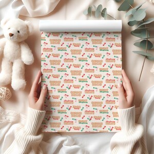May include: A roll of wrapping paper with a repeating pattern of "Ginger Bread" and "Christmas Treats" text, along with candy and bow graphics in red, green, and pink on a cream background.