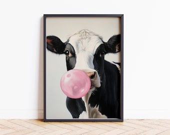 May include: A black and white cow with a pink bubble gum in its mouth. The cow is looking directly at the viewer.
