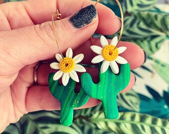 Cactus hoop earrings, cacti polymer clay earrings, cactus earrings with white flower detail.
