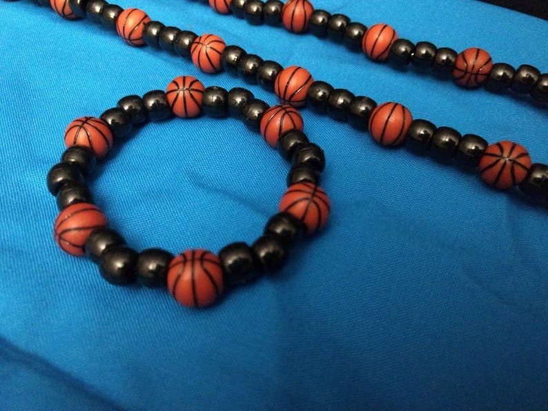 A103 Unisex basketball bracelet and necklace set.