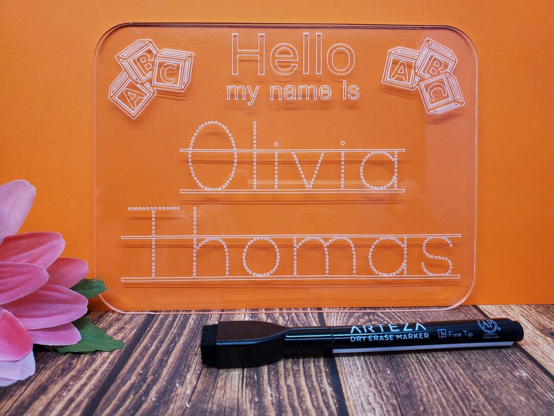 Learn to write your name on this acrylic set comes with dry erase