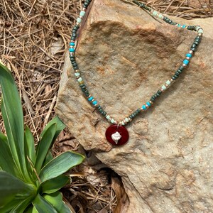 Hand beaded necklace with real seashell pendant