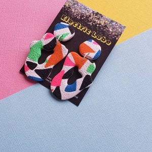 Textured White with Neon Geometric Memphis Design Wonky Organic Donut Dangle Polymer Clay Statement Earrings