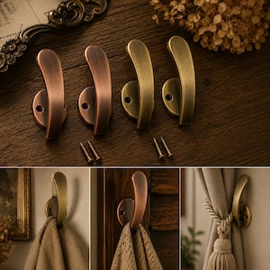May include: Set of four metal wall hooks in bronze and brass finishes. Each hook has a curved design and includes mounting screws. The hooks are shown in different settings, holding a scarf and a curtain tieback.