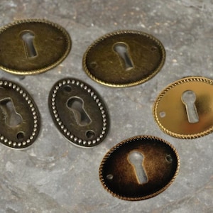 Antique brass escutcheon , vintage keyhole cover, antique brass and key plate, ornate victorian keyhole cover, sold Individually